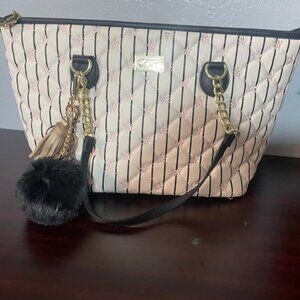 Betsey Tote: measurements 9" hide x 16" wide x  5 1/2" for the bottom.